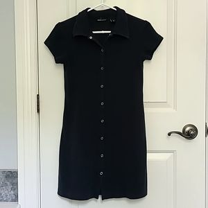 Navy t-shirt dress with collar and front snaps. Good condition, size x-small